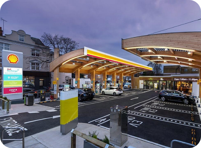 Shell Recharge EV charging station highlighting access to Shell Recharge roaming partners and over 60,000 UK public charge points.