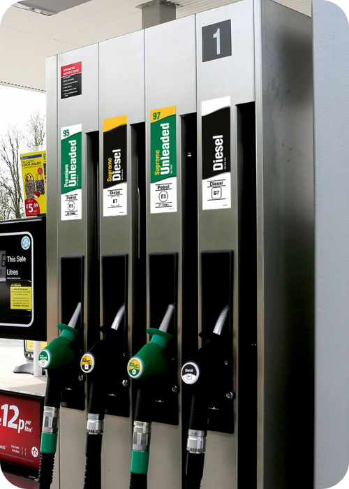 Fuel Card Vs Credit Card: Petrol and diesel fuel pumps at a UK filling station highlighting business fuel purchases and fuel card cost management.