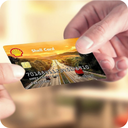 What Is A Fuel Card? Business driver holding a Shell fuel card used to pay for diesel and petrol at fuel stations across the UK.