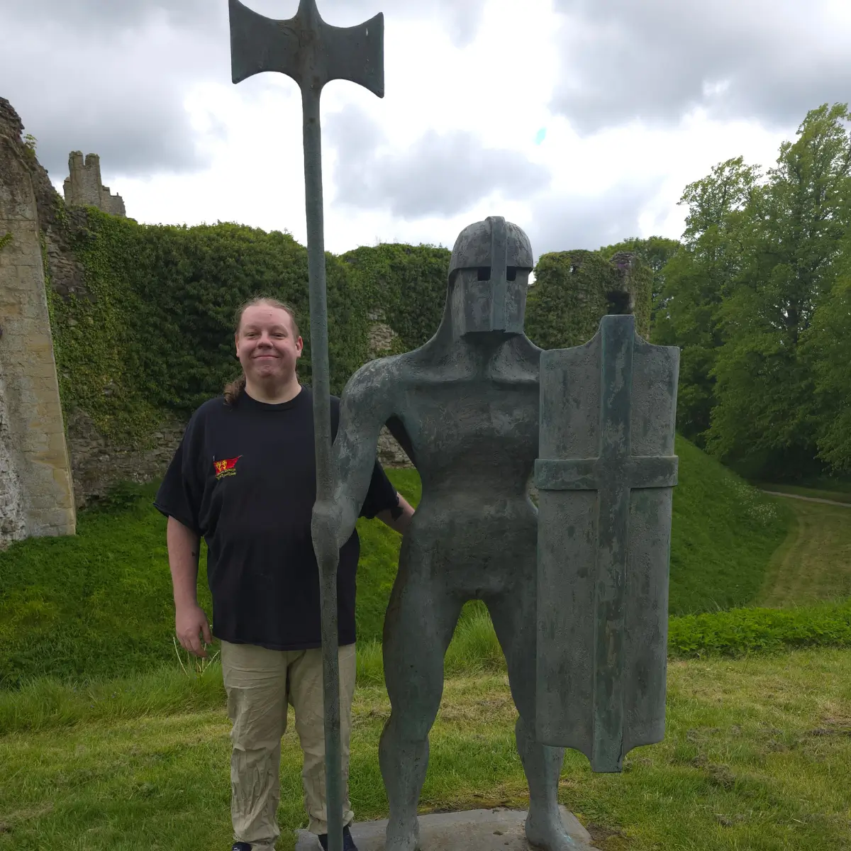 James with a statue