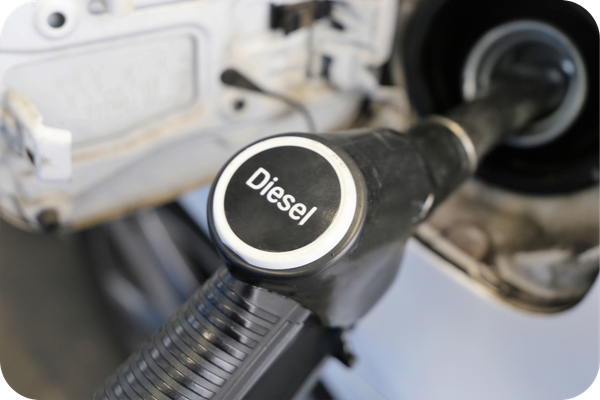 Diesel fuel nozzle refuelling a commercial vehicle, representing the UK Fuels Fuel Card for road transport, passenger transport and last mile delivery fleets.