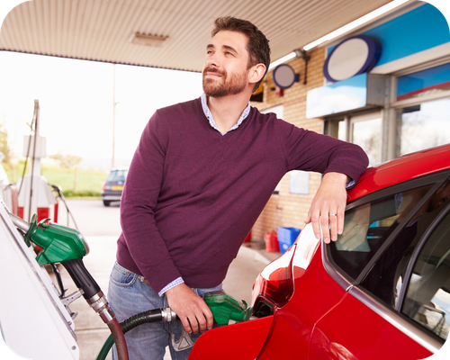 Driver refuelling a car using the Fleetmaxx fuel card savings calculator